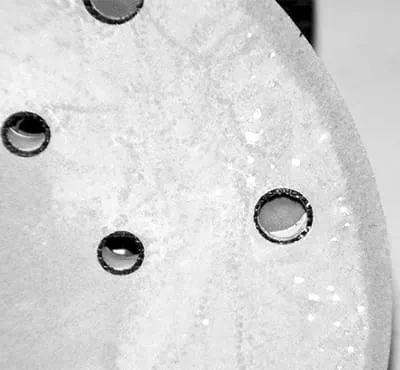 Dichtlopen van het schuurmateriaal