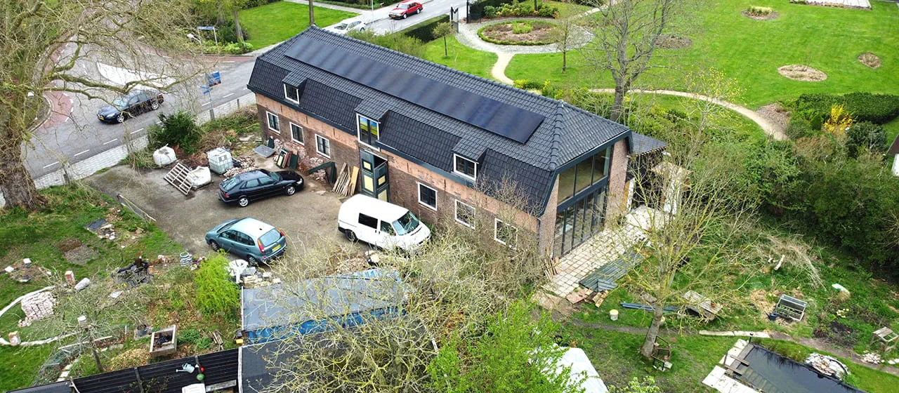 Buitenaanzicht van de voormalige fruithandel in aanbouw (achteraanzicht)